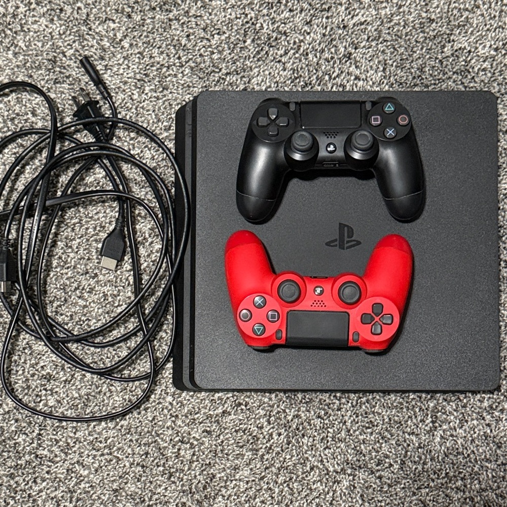 Sony PlayStation 4 Console with Black and Red Controllers 500GB and games